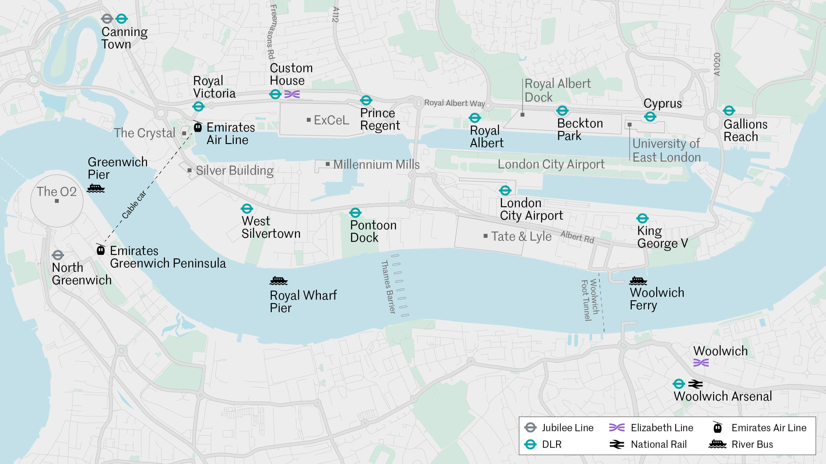 This map shows the Royal Docks area. The River Thames dominates the map, moving from west to east as it drains towards the ocean, and defining the southern boundary of the Royal Docks area. Moving from across the map from west to east, the route of the Thames starts halfway up the map. Here there is a peninsula that protrudes northward. This peninsula is Greenwich Peninsula and the O2 is labelled on it. After the river has rounded the peninsula, it curves in a south-easterly direction, then heads more or less due east, and then finally curves in a north-easterly direction in the easternmost portion of the map. The Royal Docks area lies to the north of this curve of the river. Within the Royal Docks area, there are three docks, which are open water spaces connected to the river at the easternmost end. There is one dock in the western half of the Royal Docks area, and two docks in the eastern half. There are two rows of DLR stations that run in parallel lines from west to east. One line is to the north of the river and the south of the docks. The other line is further north, to the north of the docks. The stations in the northerly line from west to east are as follows: Royal Victoria, Custom House (which is also marked with an Elizabeth Line symbol), Prince Regent, Royal Albert, Beckton Park, Cyprus and Gallions Reach. The stations in the southerly line from west to east are as follows: West Silvertown, Pontoon Dock, London City Airport, King George V. Canning Town station is to the north west of Royal Victoria and has a Jubilee Line symbol in addition to the DLR symbol. Other transport features shown include the Woolwich Ferry and Woolwich Foot Tunnel, which cross the Thames in the eastern half of the Royal Docks, near King George V. The Emirates Air Line cable car connects the Greenwich Peninsula with a location on the dock edge near Royal Victoria DLR. Greenwich Pier is also marked near the O2 with a River Bus symbol. Woolwich and Woolwich Arsenal stations are marked on the south side of the Thames. The ExCeL centre is between Custom House DLR and Prince Regent DLR. Royal Albert Docks is near Royal Albert and Beckton Park DLRs. The University of East London is near Cyprus DLR. Tate & Lyle is near London City Airport DLR. Other locations that are marked on the map are: The Crystal and the Silver Building near Royal Victoria, and Millennium Mills near Pontoon Dock.