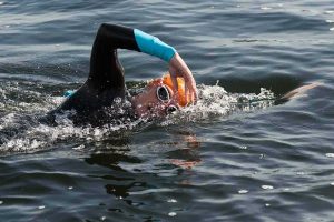 London Royal Docks Open Water Swimming, a swimmer in the water