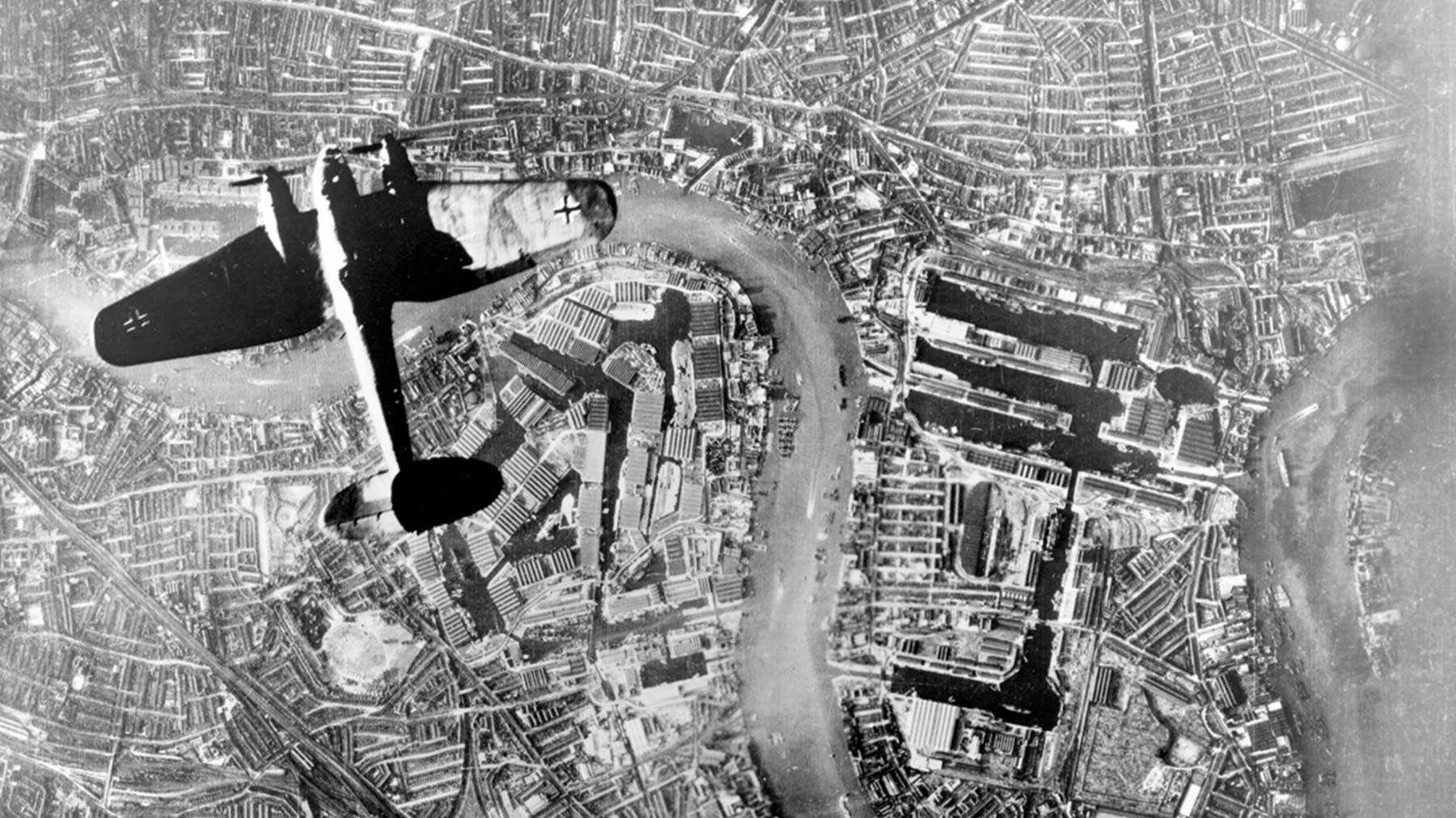 Old photo shot from the air of a plane above the river thames
