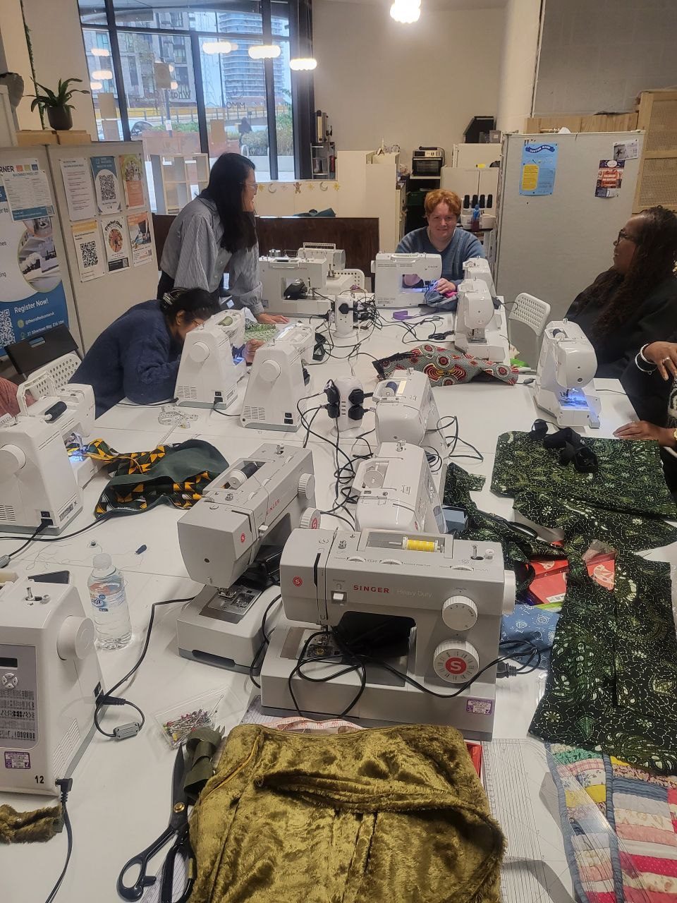 A group of sewing machines on a table