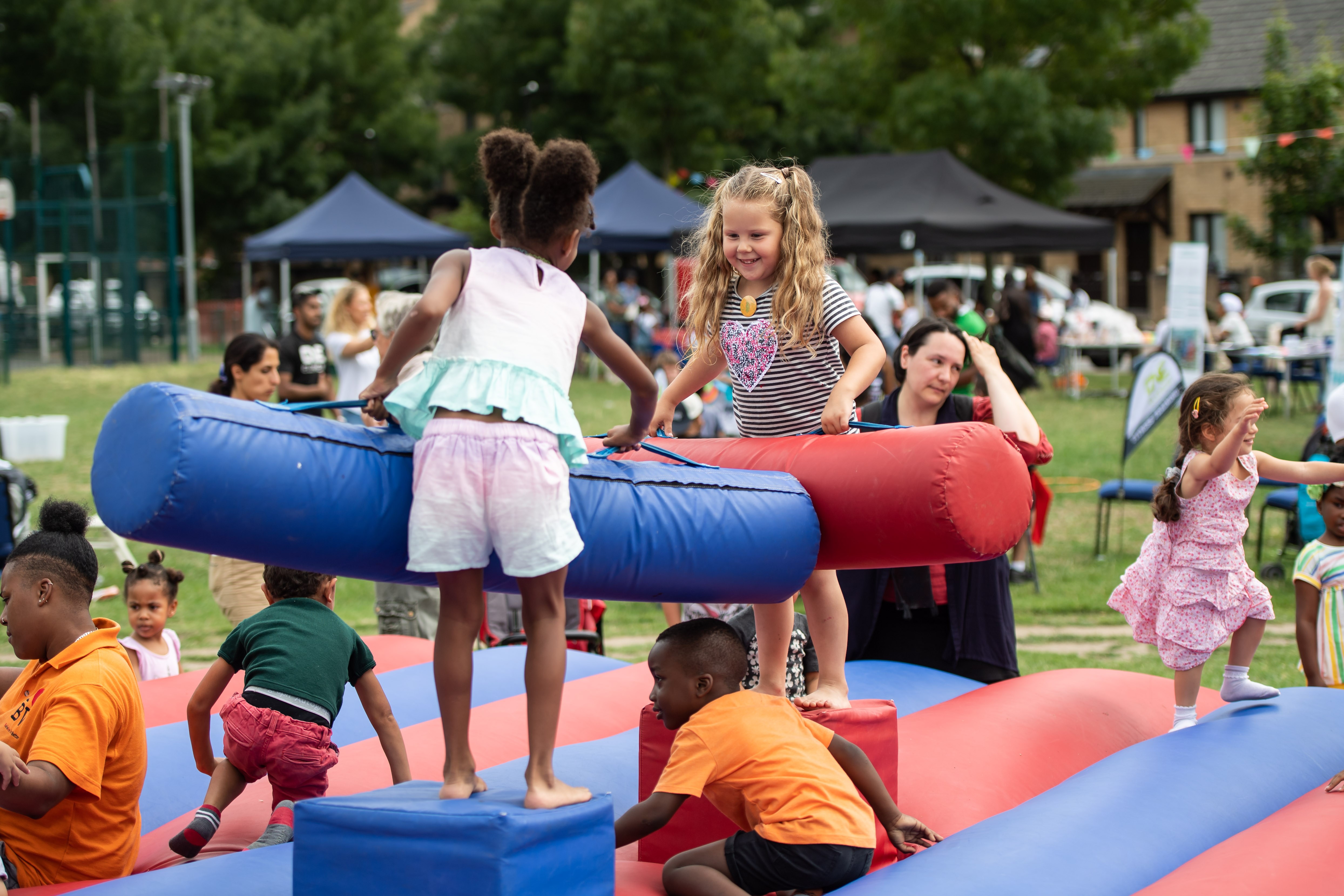 Kids enjoying a summer festival in Britannia Village