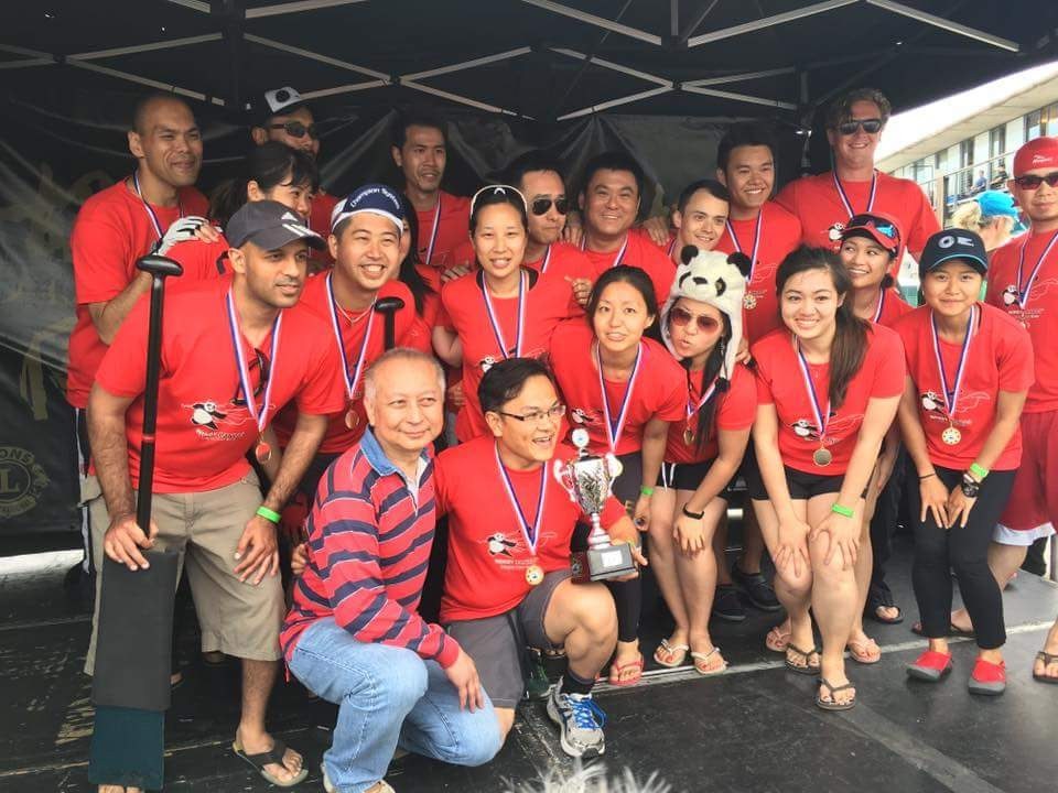 The Windy Pandas rowing team posing for a photo