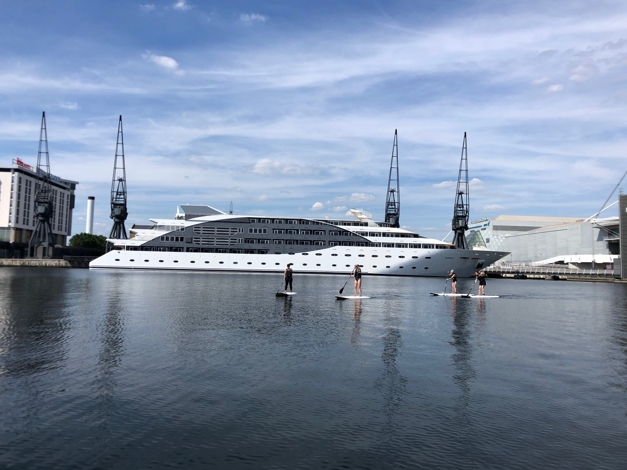 Sunborn Hotel with paddle boarders nearby