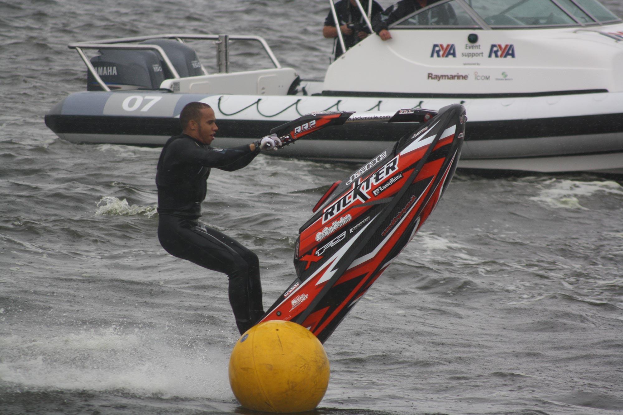 Lewis Hamilton on a jet ski in the Royal Docks