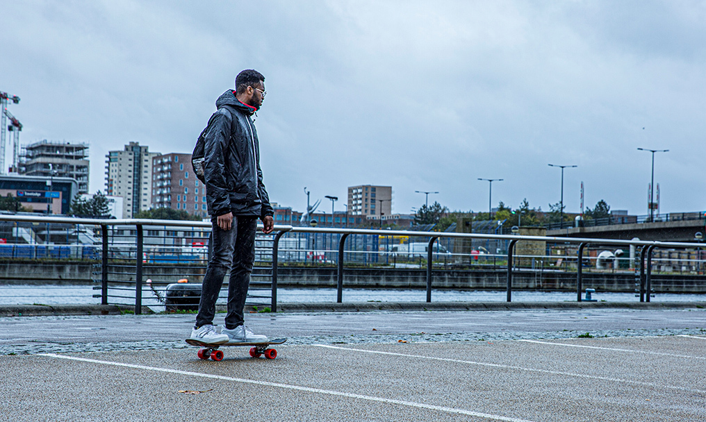 Tyrone Ferguson on a skateboard in the Royal Docks