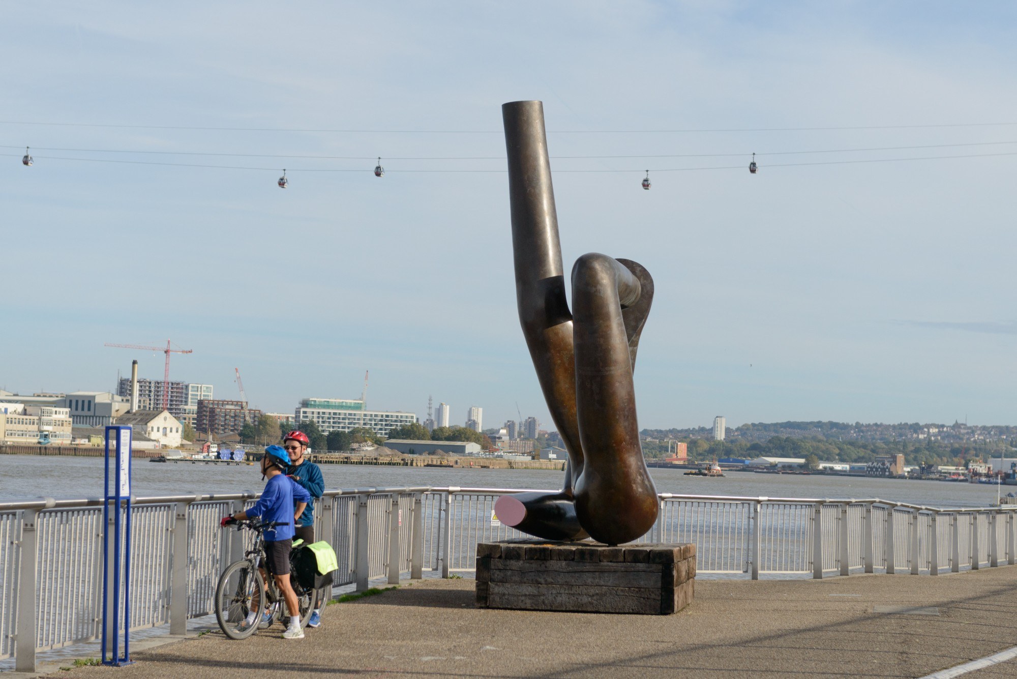 Bronze abstract sculpture reminiscent of a pair of legs