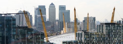 An image of Canary Wharf with The O2 in the foreground