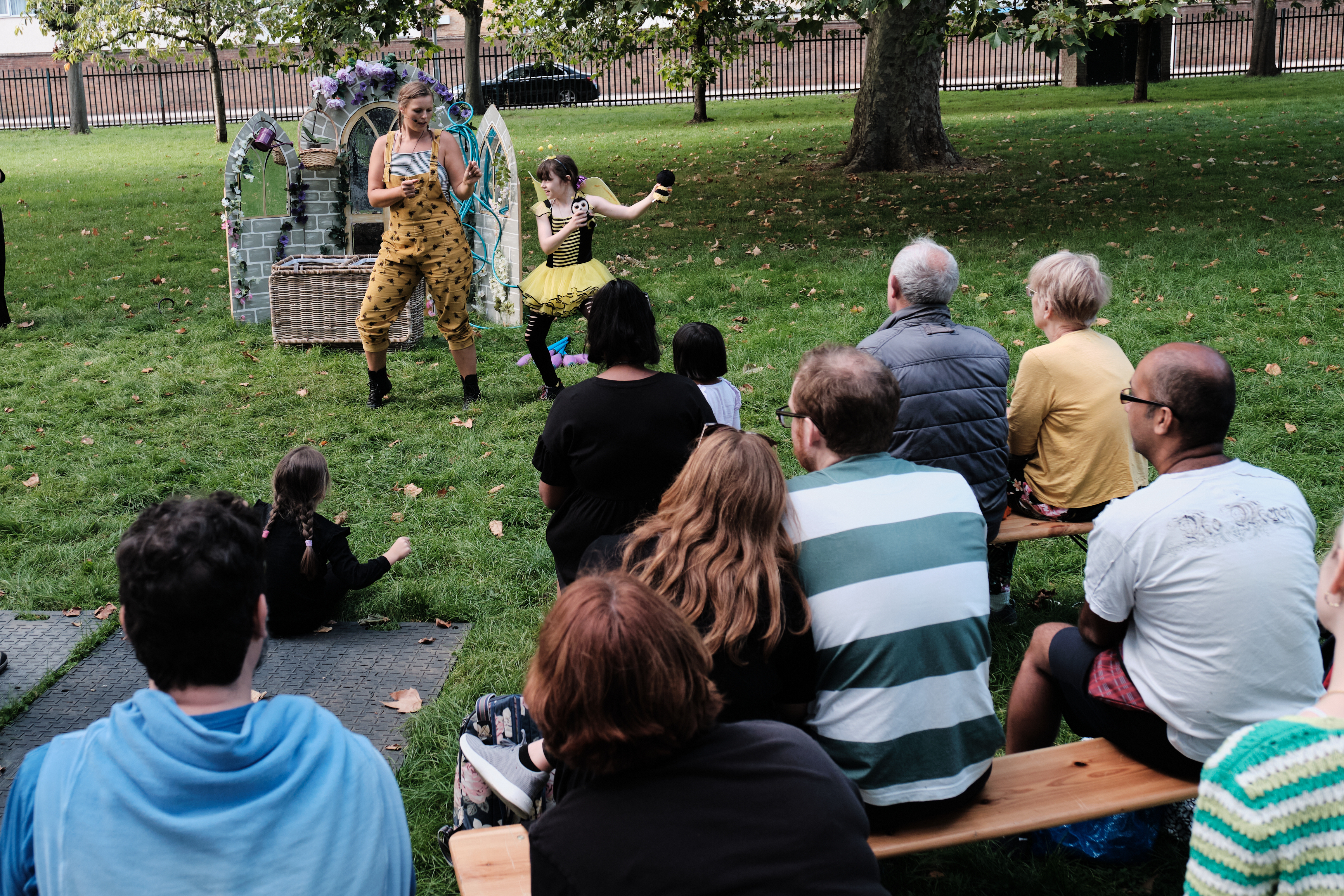 Girl in bee costume is on stage at Bee-ology