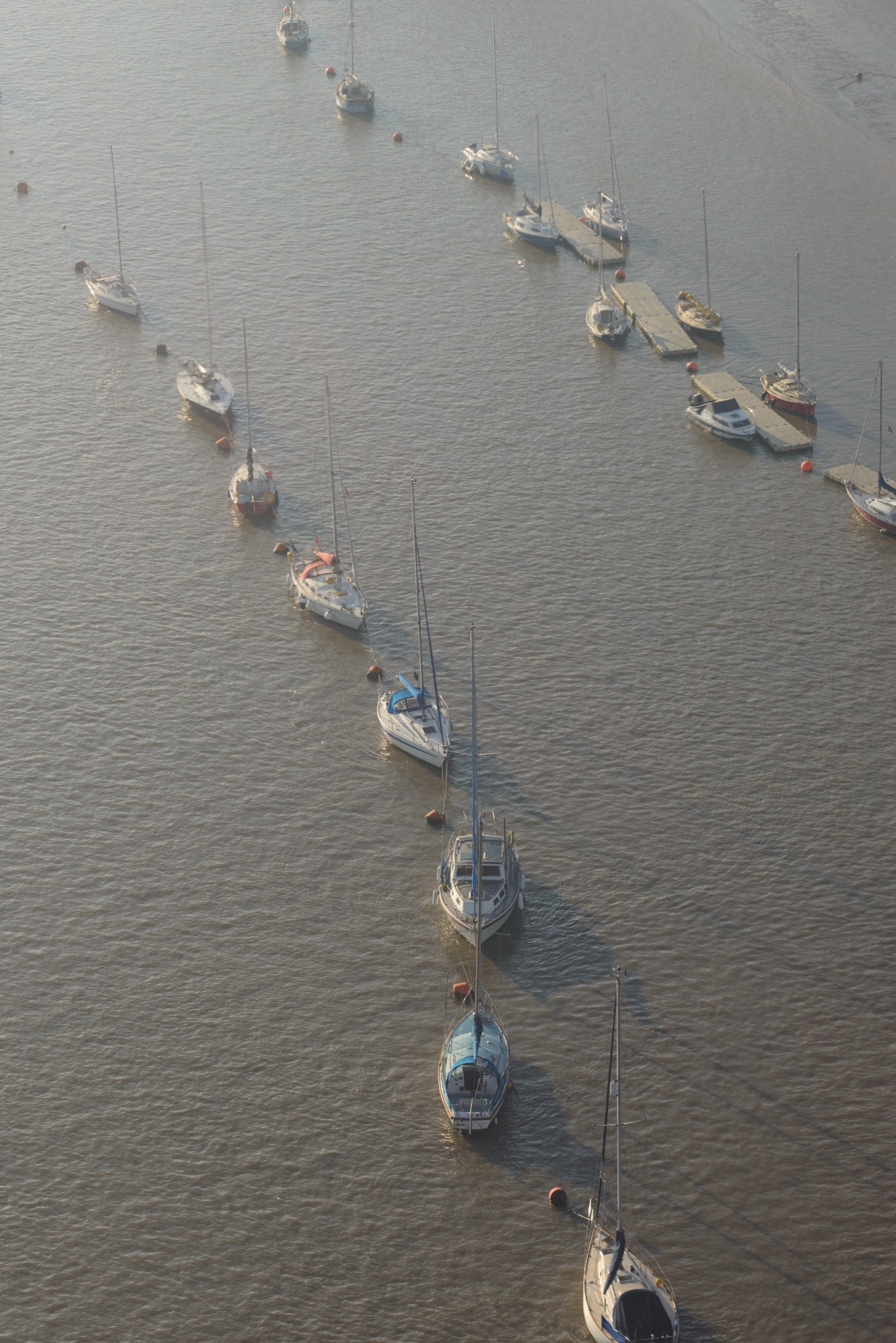 Boats moored in the Thames, seen from above