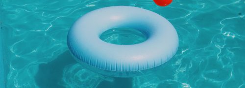 A white rubber ring in a pool