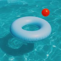 A white rubber ring in a pool