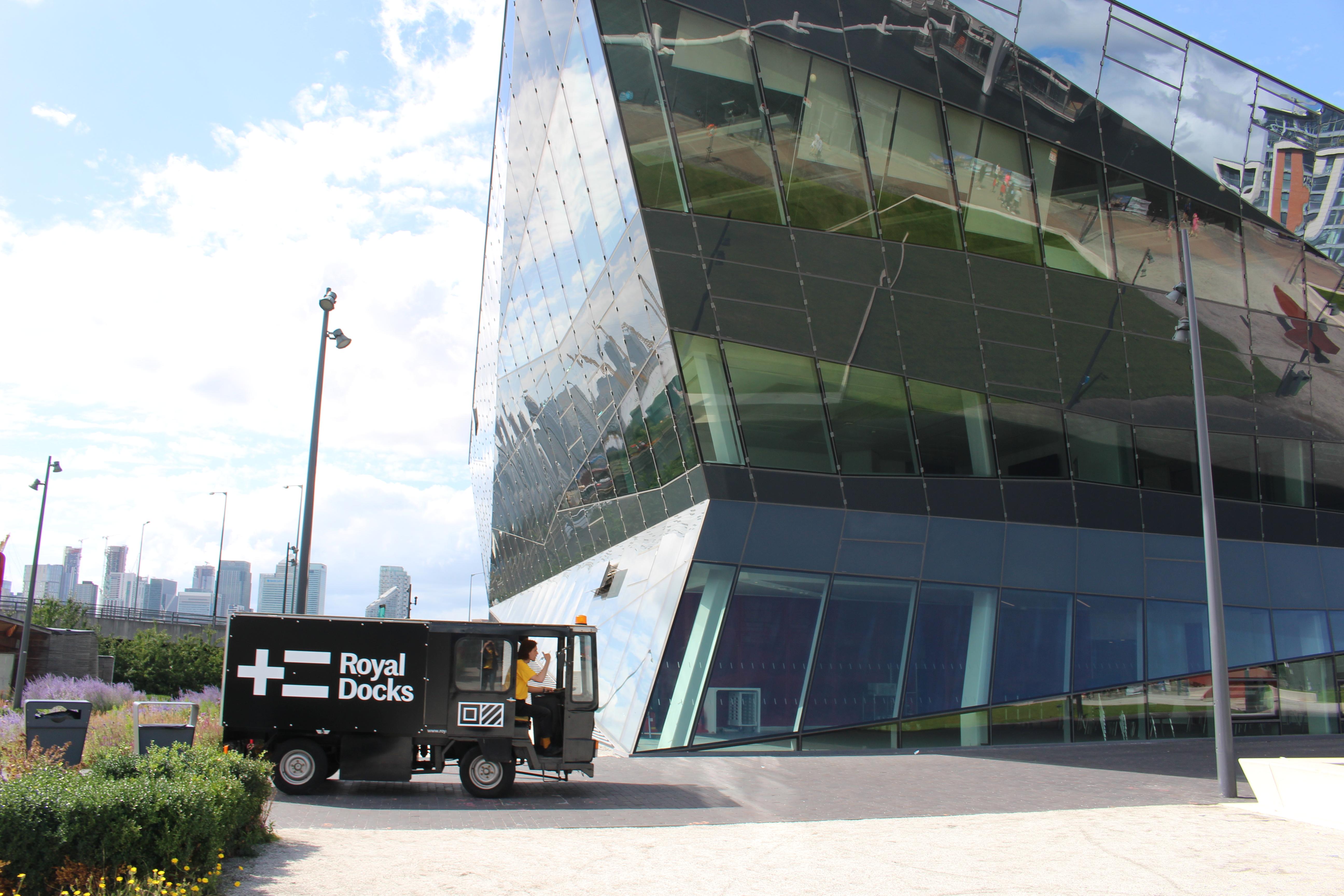 A van with the Royal Docks logo outside of The Crystal