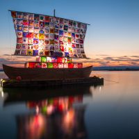 A ship with a colourful patchwork sail symbolising tolerance