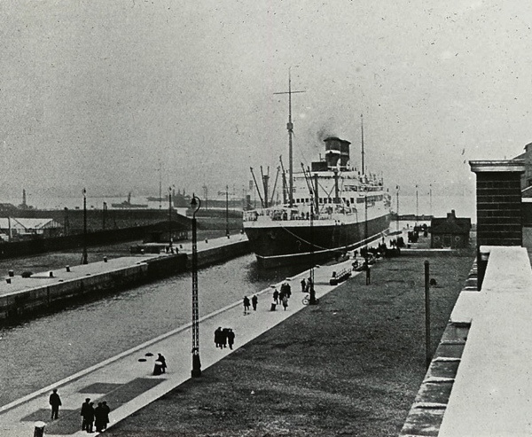 vintage photo of a large ship coming through the big lock at albert island