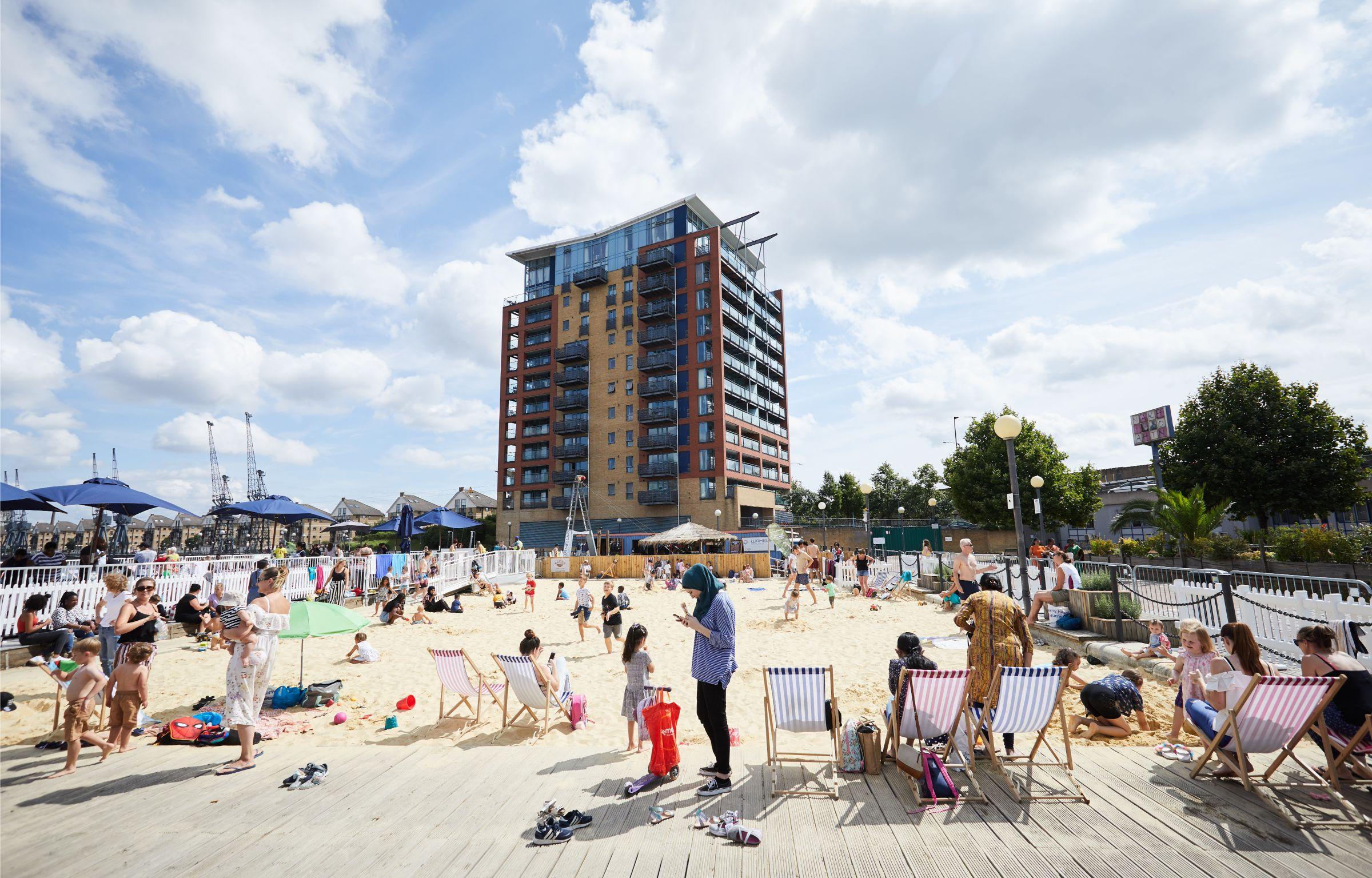 Crowd of people on the Royal Docks beach