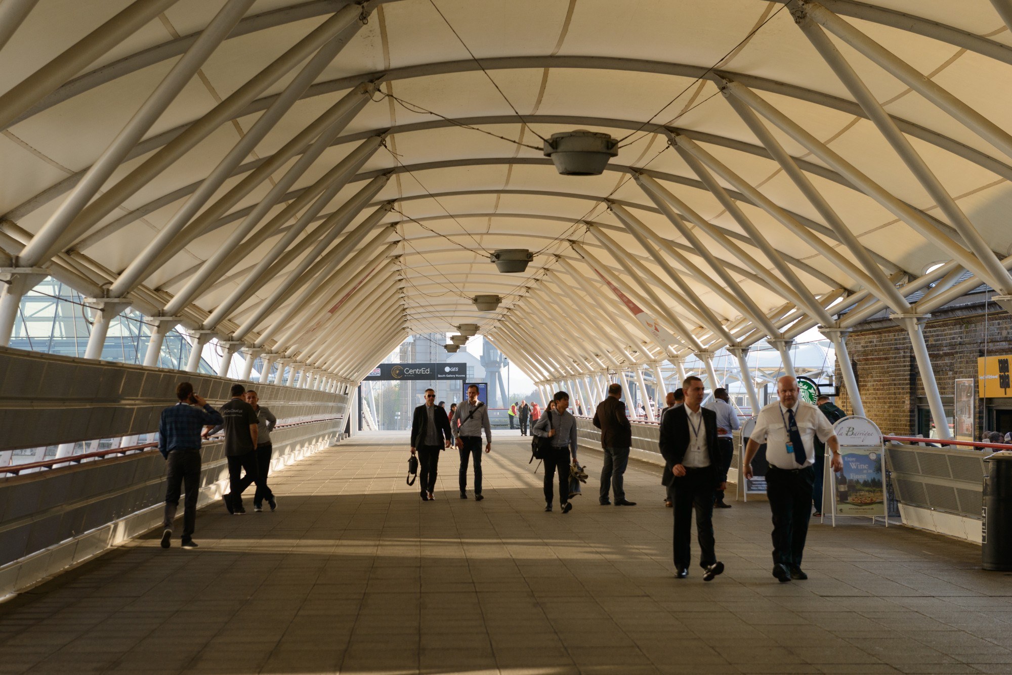 Covered walking leading from Custom House DLR to the ExCeL centre with a translucent canopy.