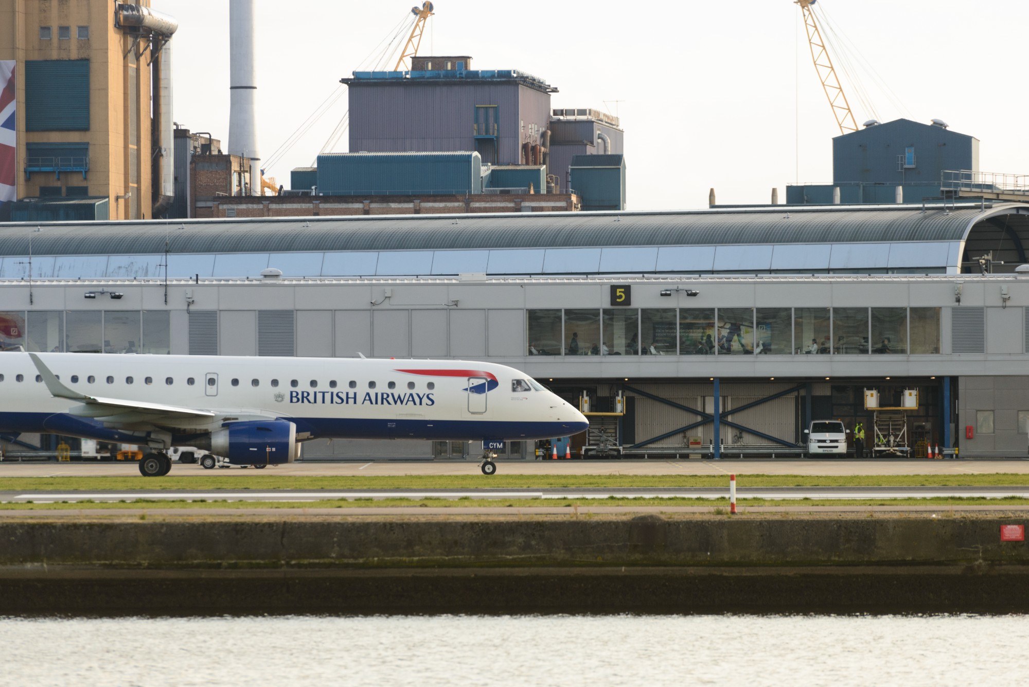 A British Airways plane on the runway at London City Airport