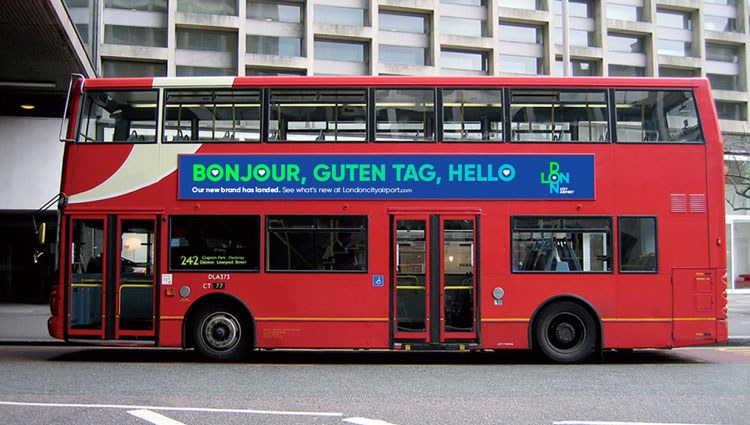 A London double decker bus on the road