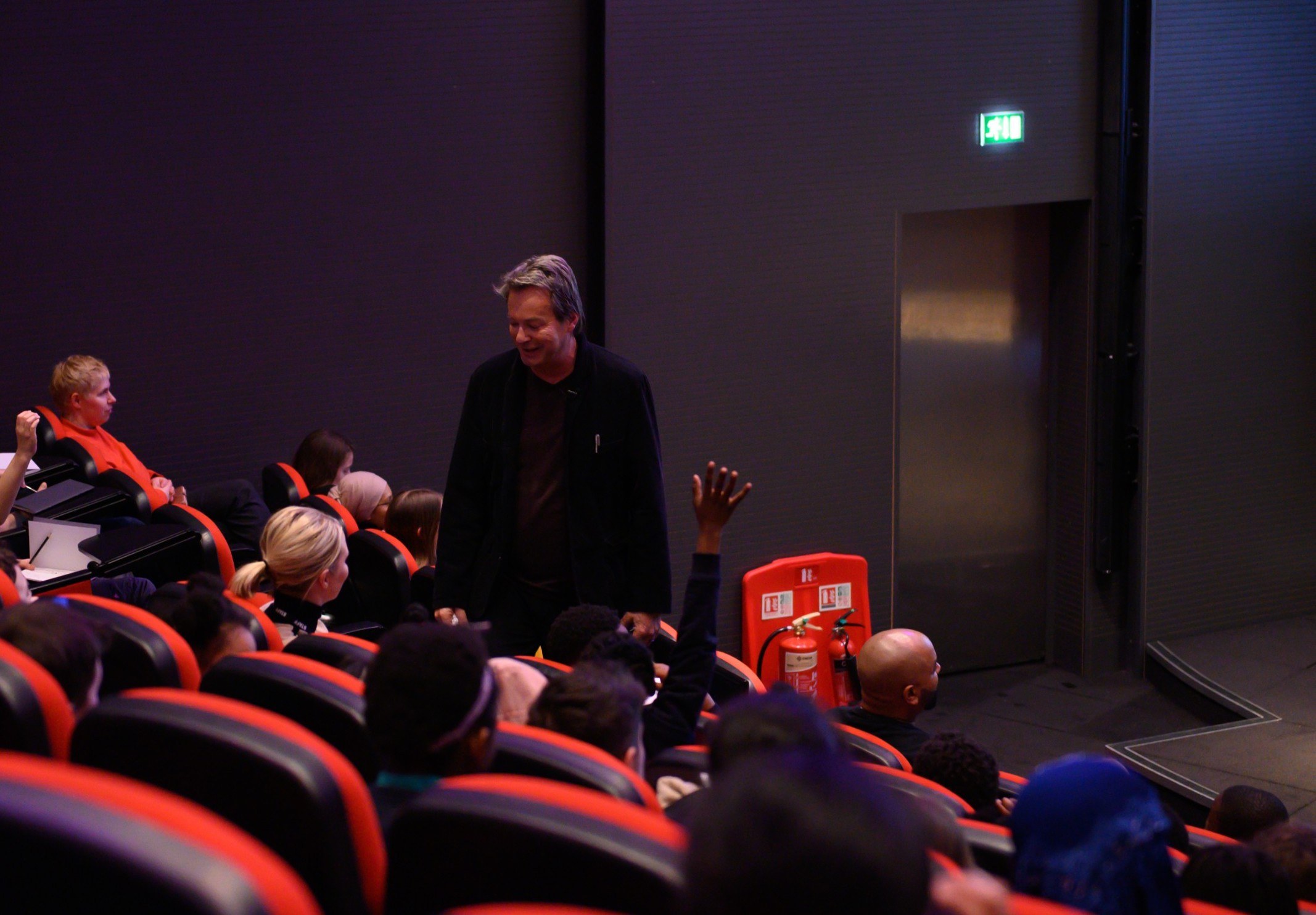 Julian Clary taking questions from audience members at Newham World Festival