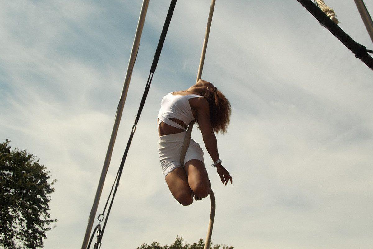 Woman performing on a rope for Upswing