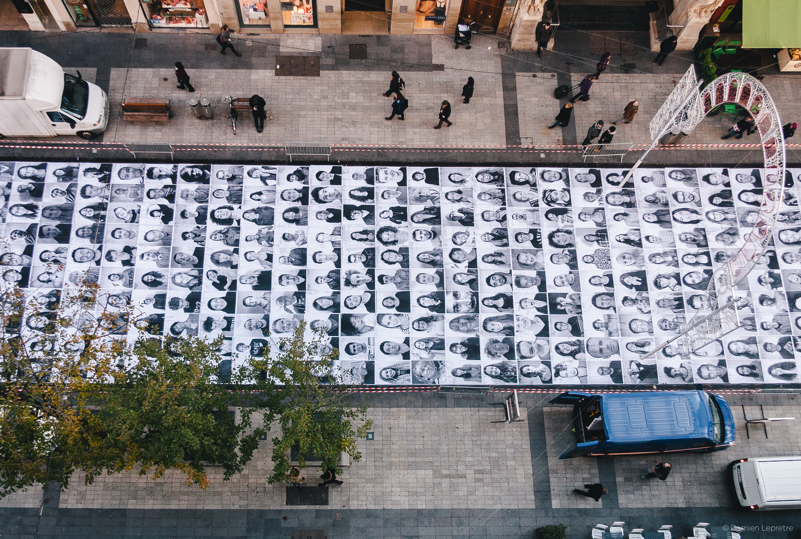 A series of portrait photos printed and place on the street for Inside Out London