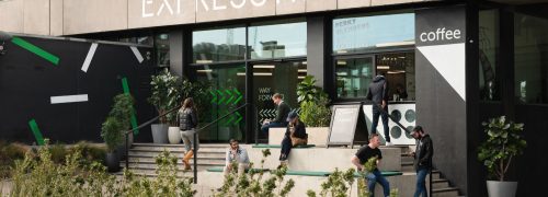 Expressway's dockside entrance on the side of Royal Victoria Dock, with coffee and planting