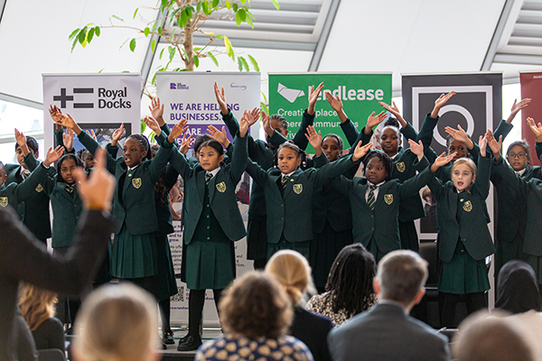 Children perform at London Living Wage event at City Hall