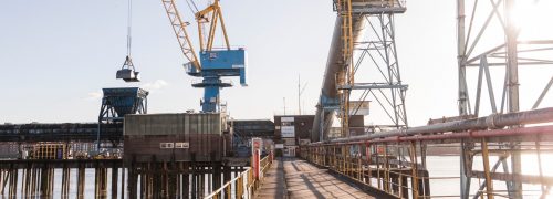 Pier with Tate & Lyle crane at work