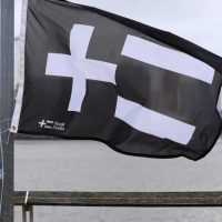 The Royal Docks logo on a flag