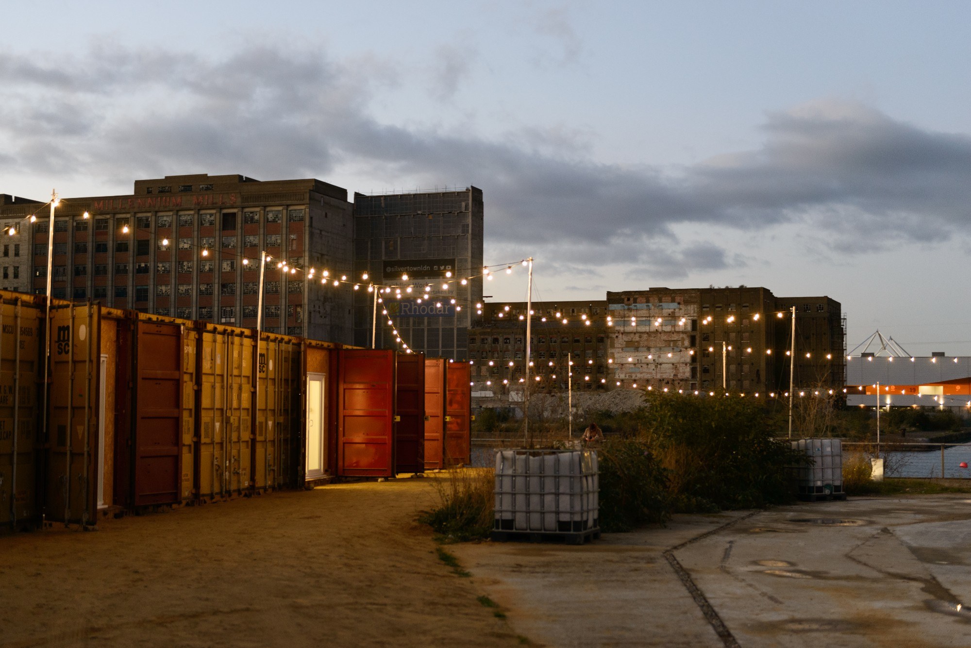 Shipping containers decorated with fairy lights