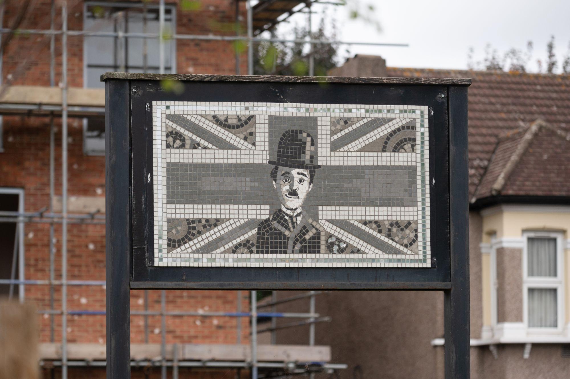 A mosaic showing Chaplin in front of the Union Jack