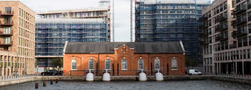 Looking down Royal Albert Wharf towards the pump house