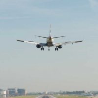 Plane above runway