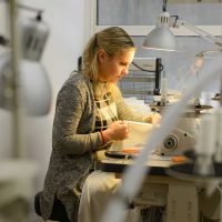 Woman working at sewing machine