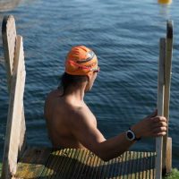 Swimmer getting into the water